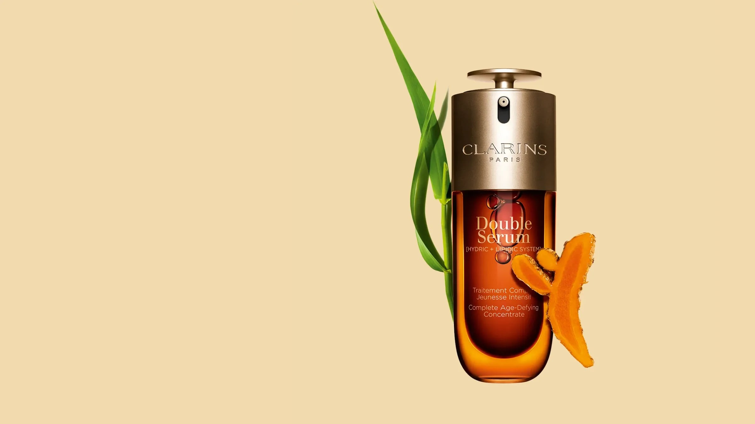 Clarins Double Serum, the house’s iconic skincare, on a plain beige background